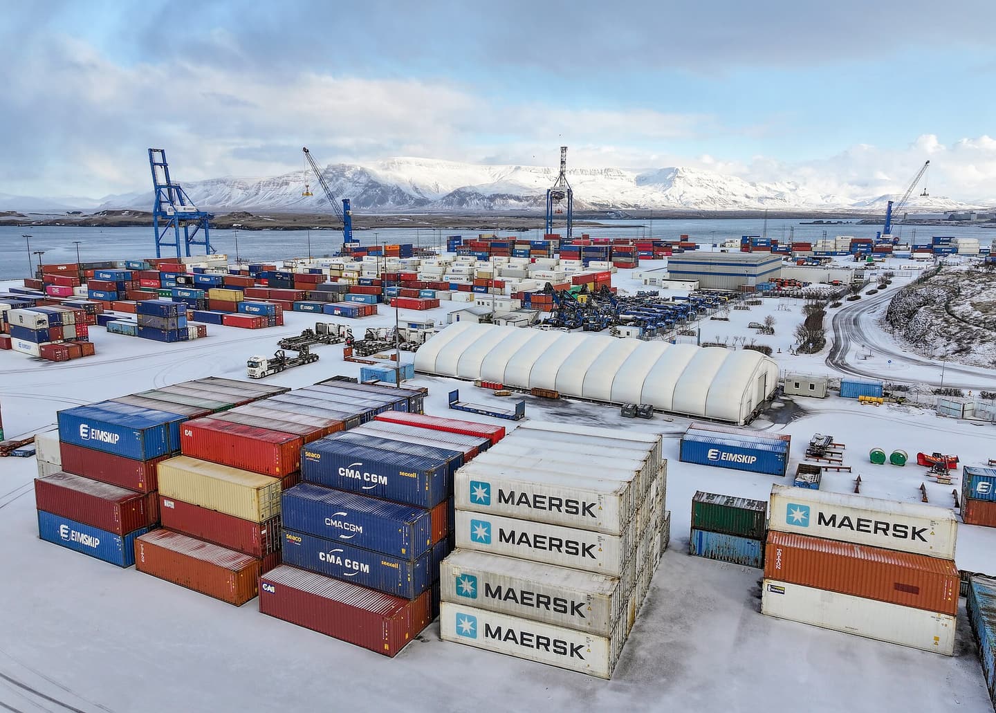 The container stops being a convenience and becomes the delivery format: everything inside, nothing pulled in