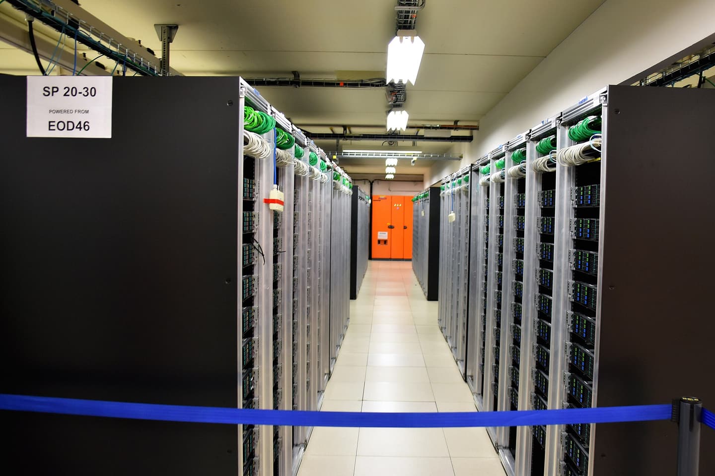 A data centre aisle closed off with tape